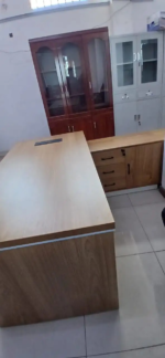 executive L-shaped table, L-shaped executive desk, executive office desk, L-shaped office table, corner executive desk, executive workstation desk, CEO L-shaped desk, manager L-shaped desk, director office desk, corporate executive desk, business executive table, professional office desk, luxury executive desk, premium executive desk, modern executive desk, contemporary L-shaped desk, minimalist executive desk, industrial executive desk, ergonomic L-shaped desk, wooden executive L-shaped table, solid wood L-shaped desk, oak L-shaped desk, walnut L-shaped desk, mahogany L-shaped desk, laminate L-shaped desk, MDF executive desk, large L-shaped executive desk, spacious corner office desk, executive computer desk, executive writing table, office workstation table, office table with storage, L-shaped desk with drawers, L-shaped desk with cabinets, L-shaped desk with filing unit, L-shaped desk with keyboard tray, L-shaped desk with cable management, L-shaped desk with hutch, lockable executive desk, durable executive desk, heavy duty office desk, stylish executive desk, modern office furniture, executive office furniture, premium office furniture, luxury office furniture, corporate office furniture, business workspace furniture, office workstation furniture, productivity office desk, home office L-shaped desk, office desk for executives, office desk for managers, office desk for directors, office desk for professionals, office desk for corporate use, office desk for home office, executive L-shaped table Kenya, executive L-shaped desk Nairobi, office furniture Kenya, L-shaped desk Kenya, office desk Kenya, modern executive office desk, premium wooden office desk, executive corner workstation, executive desk with modern design, executive desk with premium finish, executive desk with durable construction, executive desk with spacious surface, executive desk with strong frame, executive desk with scratch resistant surface, executive desk with ergonomic layout, executive desk for productivity, executive desk for long working hours
