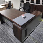 L-shaped Office Desk, L shaped desk, L shape office desk, corner office desk, L corner desk, executive L desk, L workstation desk, office workstation desk, L shaped workstation, office desk, computer desk, office furniture, ergonomic office desk, modern office desk, wooden L shaped desk, executive office furniture, professional office desk, home office desk, large office desk, spacious office desk, corner workstation, office corner table, office work table, business desk, corporate office desk, manager desk, executive desk, CEO desk, director desk, premium office desk, luxury office desk, contemporary office desk, minimalist office desk, stylish office desk, office desk with drawers, L desk with storage, L desk with cabinets, L desk with shelves, L desk with drawers, office storage desk, workstation furniture, office workspace furniture, productivity desk, ergonomic workstation, computer workstation, gaming office desk, dual monitor desk, multi monitor desk, laptop workstation desk, writing desk, study desk, home workspace desk, remote work desk, office setup furniture, office interior furniture, office décor furniture, commercial office furniture, business office furniture, employee workstation, professional workstation, executive workstation, office cabin desk, private office desk, corporate workstation, open office furniture, modern workspace solution, office organization furniture, cable management desk, spacious tabletop desk, durable office desk, sturdy workstation, heavy duty office desk, engineered wood desk, MDF office desk, laminate office desk, metal frame desk, premium finish desk, adjustable office desk, comfortable workspace desk, efficient office desk, space saving office desk, compact L desk, large L desk, L shaped computer table, L shaped work table, L shaped executive desk, L shaped manager desk, L shaped office workstation, L shaped corporate desk, L shaped business desk, L shaped professional desk, L shaped furniture, corner furniture, office furniture collection, office desk collection, office desk design, office desk style, office desk solution, office desk supplier, office desk manufacturer, office desk wholesale, office desk retailer, office desk online, buy office desk, office desk sale, office desk price, affordable office desk, premium office furniture, quality office desk, office desk Kenya, L shaped desk Kenya, Nairobi office furniture, office furniture Kenya, modern office furniture Kenya, executive office desk Kenya, ergonomic desk Kenya, workspace furniture Kenya, L workstation Kenya, office desk for executives, office desk for managers, office desk for employees, office desk for professionals, office desk for designers, office desk for architects, office desk for programmers, office desk for accountants, office desk for students, office desk for home office, office desk for business, office desk for startup, office desk for corporate office, office desk for small office, office desk for large office, office desk for conference room, office desk for private office, office desk with ample legroom, office desk with wide surface, office desk with modern design, office desk with functional storage, office desk with premium materials, office desk with durable construction, office desk with clean lines, office desk with elegant finish, office desk with practical design, office desk with cable organizer, office desk with monitor stand, office desk with side extension, office desk with return table, office desk with corner extension, office desk workstation solution, L shaped workstation furniture, L shaped office furniture, corner workstation furniture, executive corner desk, modern corner desk, ergonomic corner workstation, professional corner desk, office productivity furniture, workspace organization solution, office improvement furniture, office renovation furniture, office planning furniture, office furnishing solution, office storage solution, office layout solution, collaborative workstation desk, multi purpose office desk, versatile office desk, functional workstation, practical office furniture, elegant office workstation, timeless office desk, premium L shaped workstation, luxury corner desk, high quality office desk, durable office workstation, efficient workspace desk, smart office desk, contemporary L desk, classic L desk, traditional office desk, commercial L desk, industrial office desk, office desk system, modular L desk, customizable L desk, flexible office desk, office workstation system, office desk setup, executive workspace furniture, corporate workspace solution, office productivity solution, office desk accessories, office essentials furniture, L shaped desk furniture.